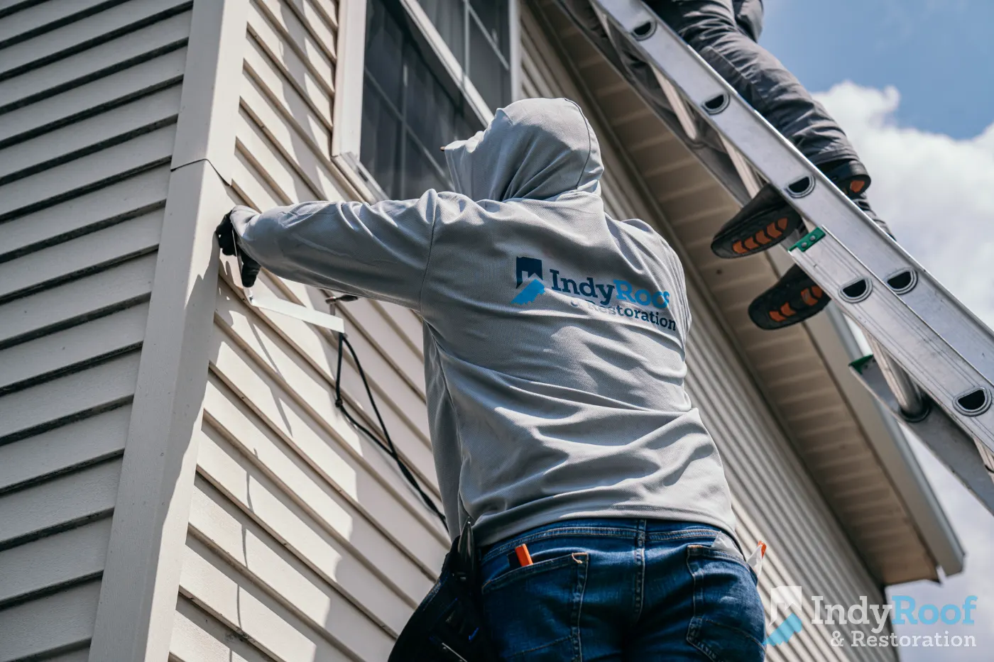 Storm-damaged window documented in Spiceland